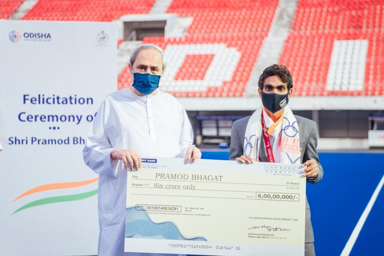 Chief Minister Naveen Patnaik Felicitates Pramod Bhagat with 6 crores cash award