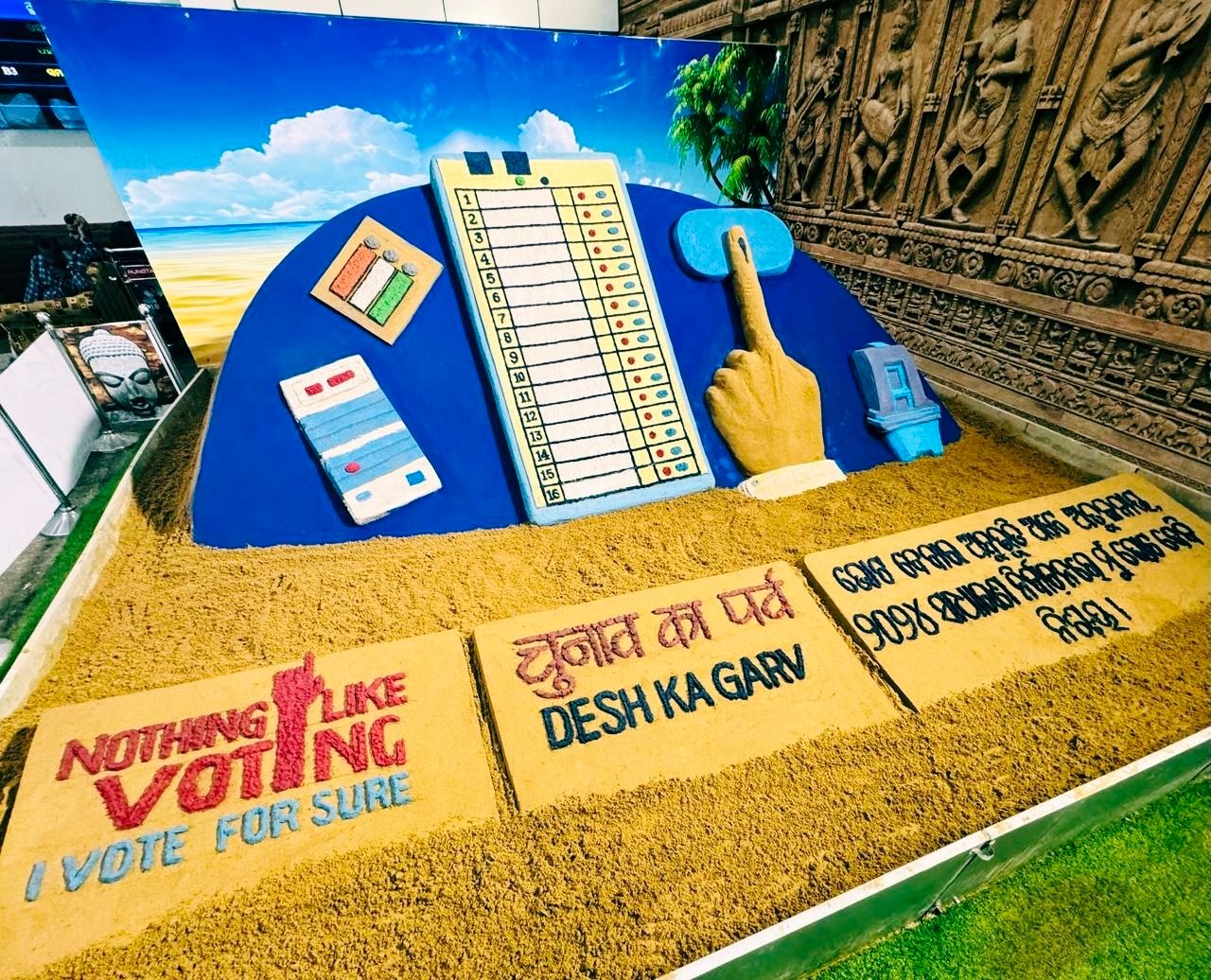 Sand artist Sudarsan Pattnaik creates giant sculpture to promote voting